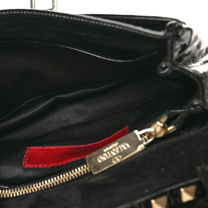 Valentino Garavani Patent Rockstud Flip Lock Flap Black