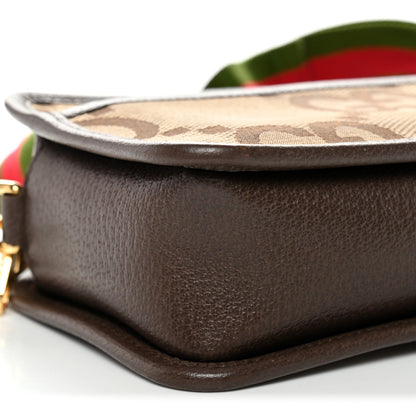 Gucci Monogram Jumbo GG Textured Dollar Calfskin Web Mini Crossbody Bag Camel Ebony New Acero