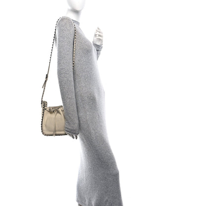 Valentino Garavani Grained Calfskin Rockstud Bucket Bag Ivory