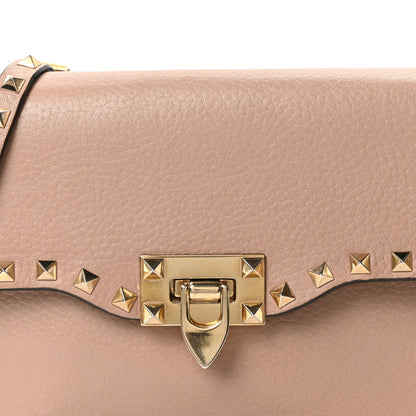 Valentino Garavani Pebbled Calfskin Medium Rockstud Flip Lock Crossbody Bag Skin Sorbet