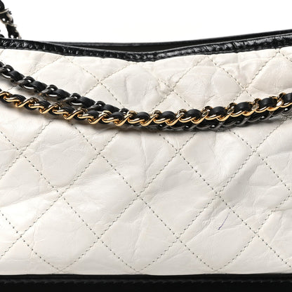 Chanel Aged Calfskin Quilted Medium Gabrielle Hobo Black White