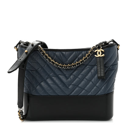 Chanel Aged Calfskin Chevron Quilted Medium Gabrielle Hobo Navy Black